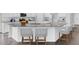 Modern kitchen boasts granite countertops, stainless steel appliances, and bar seating at 109 Orchard Blossom Ln, Summerville, SC 29485