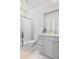 Bathroom featuring a marble floor, sleek vanity, and glass-enclosed shower at 114 Battle Boat Blvd, Summerville, SC 29485