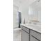 Well-lit bathroom featuring a shower and tub, modern vanity with sink, and stylish neutral decor at 114 Battle Boat Blvd, Summerville, SC 29485