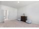 Bright bedroom features a dresser and stylish striped ottoman seating at 114 Battle Boat Blvd, Summerville, SC 29485