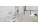 Upstairs Bonus Room with cozy white sofa and casual decor has soft lighting and carpet at 114 Battle Boat Blvd, Summerville, SC 29485