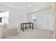 Bright office space featuring a large desk, comfortable armchair, and plenty of natural light at 114 Battle Boat Blvd, Summerville, SC 29485