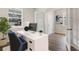Bright home office with a modern desk, comfortable chair, and a window providing natural light at 118 Orchard Blossom Ln, Summerville, SC 29485