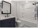 Clean bathroom with a modern vanity, black hardware, and a shower-tub combination at 123 Leeward Lndg, Summerville, SC 29486