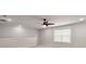 Bright bedroom featuring a black ceiling fan, large window, and clean white trim at 123 Leeward Lndg, Summerville, SC 29486