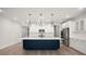 Bright kitchen features a large blue island with white countertops and stainless steel appliances at 123 Leeward Lndg, Summerville, SC 29486
