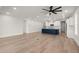 Large living room features an open floor plan and a modern kitchen with a large island at 123 Leeward Lndg, Summerville, SC 29486