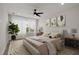 Comfortable main bedroom with a ceiling fan, natural light, and neutral decor at 123 Leeward Lndg, Summerville, SC 29486
