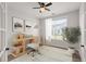 Stylish home office with a ceiling fan, large window, modern decor, and ample workspace at 123 Leeward Lndg, Summerville, SC 29486