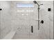 Bathroom shower features marble tile, glass doors, and black shower fixtures at 123 Leeward Lndg, Summerville, SC 29486