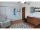 Bedroom with hardwood floors, ceiling fan, natural light, and contemporary decor at 124 Brush Blvd, Goose Creek, SC 29445