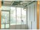 A well-lit porch with a ceiling fan, offering an inviting view of the backyard at 124 Brush Blvd, Goose Creek, SC 29445