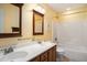 Bright bathroom with double sink vanity, framed mirrors, white shower and tub combo at 133 Guildford Dr, Goose Creek, SC 29445