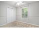 Bedroom with carpet, ceiling fan, closet and window, offering bright natural light at 133 Guildford Dr, Goose Creek, SC 29445