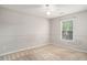 Neutral bedroom with carpet, trim, ceiling fan, and a window providing natural light at 133 Guildford Dr, Goose Creek, SC 29445