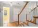 Inviting entryway with hardwood floors and a staircase leading to the upper level at 133 Guildford Dr, Goose Creek, SC 29445