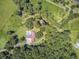 Expansive property featuring a home with a pool, surrounded by lush greenery and mature trees at 138 Brant Acres Ln, Bonneau, SC 29431