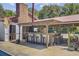 Outdoor bar area perfect for entertaining, featuring ample seating and a rustic design at 138 Brant Acres Ln, Bonneau, SC 29431