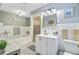 Bright bathroom with a soaking tub, vanity, and stylish tile flooring at 138 Brant Acres Ln, Bonneau, SC 29431