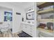 Well-lit bathroom featuring a sleek vanity, modern fixtures, and an adjacent toilet area for added convenience at 138 Brant Acres Ln, Bonneau, SC 29431