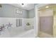 Inviting bathroom showcasing a jetted tub and glass-enclosed shower at 138 Brant Acres Ln, Bonneau, SC 29431