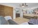 Relaxing main bedroom featuring seating area, wood floors, and ensuite bath access at 138 Brant Acres Ln, Bonneau, SC 29431