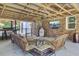 Cozy covered patio with seating, a TV, and heater for year-round enjoyment at 138 Brant Acres Ln, Bonneau, SC 29431