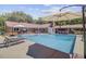 Spacious backyard pool with ample seating and a covered outdoor bar area at 138 Brant Acres Ln, Bonneau, SC 29431