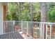 View of an outdoor balcony overlooking a lush green scenery filled with trees at 1604 Basildon Rd, Mount Pleasant, SC 29466