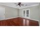 Bright bedroom with hardwood floors and access to an outdoor balcony at 1604 Basildon Rd, Mount Pleasant, SC 29466
