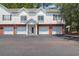 Well-maintained townhouse with attached garages and a welcoming entrance at 1604 Basildon Rd, Mount Pleasant, SC 29466