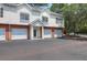 Inviting two-story townhouse featuring attached garages and a manicured lawn at 1604 Basildon Rd, Mount Pleasant, SC 29466