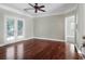 Elegant living room with hardwood floors and access to an outdoor balcony at 1604 Basildon Rd, Mount Pleasant, SC 29466