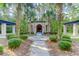 Beautiful outdoor pavilion surrounded by lush landscaping and palm trees for neighborhood gatherings at 1604 Basildon Rd, Mount Pleasant, SC 29466