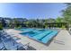 Large community pool with lounge chairs surrounded by lush landscaping for relaxation and enjoyment at 1604 Basildon Rd, Mount Pleasant, SC 29466