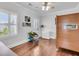 Bedroom with hardwood floors, natural light, ceiling fan, and modern furniture at 1636 Rivertowne Country Club Dr, Mount Pleasant, SC 29466