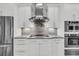 Modern kitchen with granite counters, stainless appliances, and a gas cooktop at 1636 Rivertowne Country Club Dr, Mount Pleasant, SC 29466