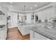 Gourmet kitchen with large island, granite counters, and stainless steel appliances at 1636 Rivertowne Country Club Dr, Mount Pleasant, SC 29466