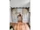 Living room featuring sliding barn doors and hardwood floors at 1636 Rivertowne Country Club Dr, Mount Pleasant, SC 29466