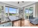 Bright office space with expansive views and access to the outdoor screened-in porch at 1636 Rivertowne Country Club Dr, Mount Pleasant, SC 29466