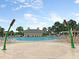 Resort-style pool with ample lounge chairs, umbrellas, and a bath house, offering a relaxing oasis for residents at 1636 Rivertowne Country Club Dr, Mount Pleasant, SC 29466