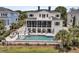 Luxury home featuring a swimming pool, screened in porch and spacious back yard at 1636 Rivertowne Country Club Dr, Mount Pleasant, SC 29466