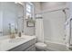 Clean bathroom includes a vanity with brushed nickel fixtures and a shower-tub combination with white tiling at 1641 Adventure Xing, Mount Pleasant, SC 29466
