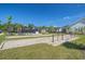 Bocce ball court surrounded by manicured landscaping, residential homes, and community amenities at 1641 Adventure Xing, Mount Pleasant, SC 29466
