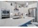 Modern kitchen featuring stainless steel appliances, white cabinets, and a kitchen island at 1641 Adventure Xing, Mount Pleasant, SC 29466
