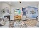 Inviting living room with fireplace, modern furnishings, and a soothing blue accent wall that creates a relaxing atmosphere at 1641 Adventure Xing, Mount Pleasant, SC 29466