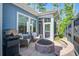 Cozy outdoor patio with fire pit and grill, perfect for entertaining guests at 1641 Adventure Xing, Mount Pleasant, SC 29466