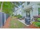 Cozy backyard patio, ideal for outdoor seating and entertaining with a grill at 1666 Bridwell Ln, Mount Pleasant, SC 29466