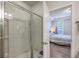 Bathroom with glass door shower and view into bedroom at 1666 Bridwell Ln, Mount Pleasant, SC 29466