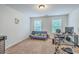 Spacious bedroom featuring a futon, desk and gym equipment at 1666 Bridwell Ln, Mount Pleasant, SC 29466